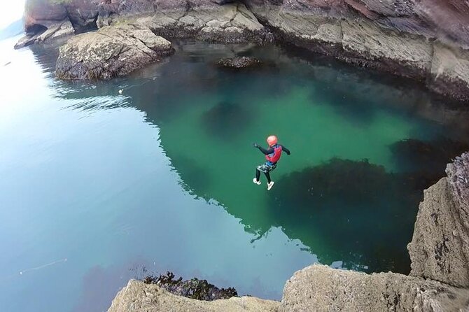 Coasteering Geopark Adventure In Torquay - Bouldering and climbing between the water and rock