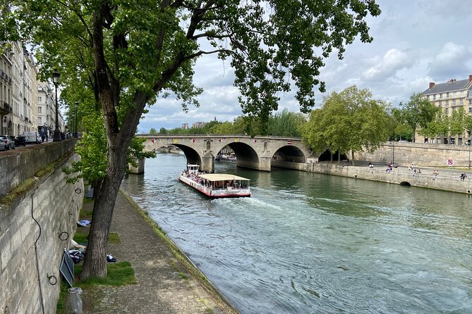 Guided Luxury Paris Day Trip with Optional Lunch at the Eiffel Tower - The Louvre stop is brief by design