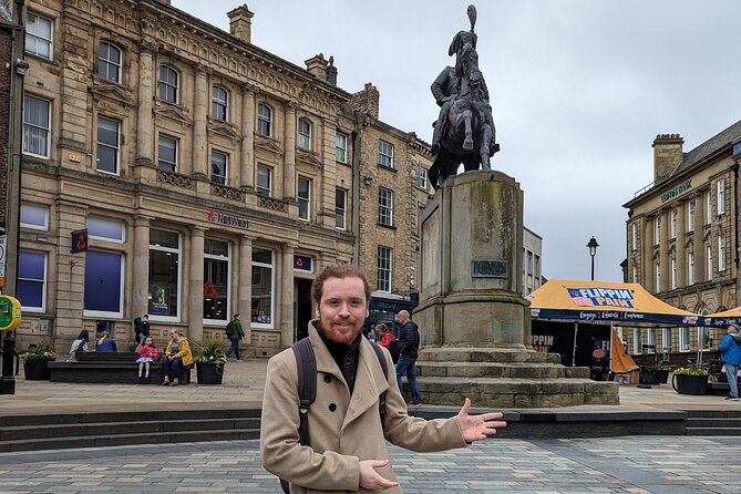 Guided Walking Tour of Durham & its Infamous Characters - Starting in the Market Place with mining and statues