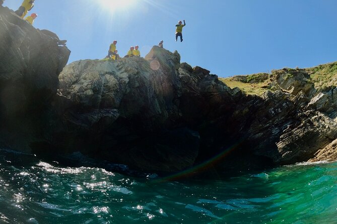 Half-Day Coasteering in Newquay Cornwall - Weather, sea conditions, and the flexible itinerary