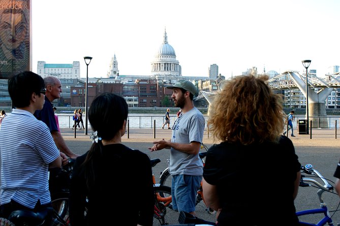 Highlights of Royal London Bike Tour with River Cruise Package - Crossing Tower Bridge and stopping for a beer