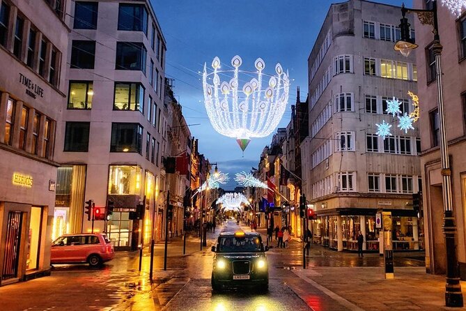 London Christmas Lights Guided Tour by Cab - Bond Street adds polished window displays