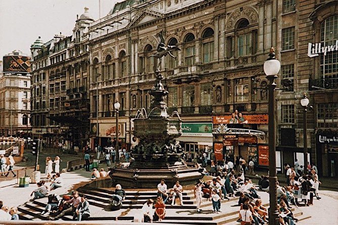 London Soho District Guided Walking Tour Semi-Private 12ppl Max - Piccadilly Circus: a loud beginning