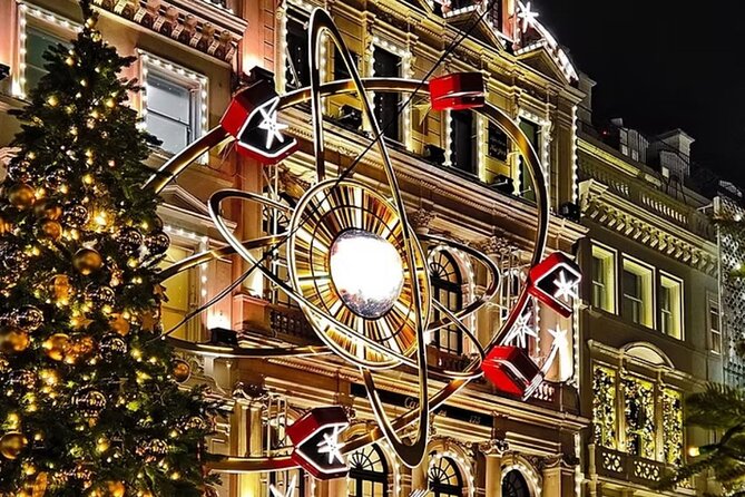Magical London Christmas Lights Walking Tour with a Londoner - Piccadilly Circus mixes screens with seasonal sparkle
