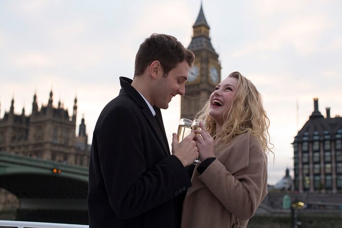River Thames Evening Cruise with Sparkling wine and Canapés - HMS Belfast and Canary Wharf